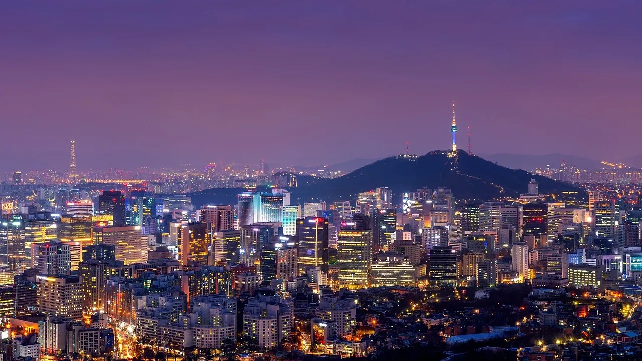 Seoul at dusk with N Seoul Tower on Namsan above the city lights
