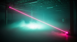 Thick dry-ice fog rolling across a warehouse dance floor, pink laser cutting through the haze, teal light below, early 1990s rave atmosphere