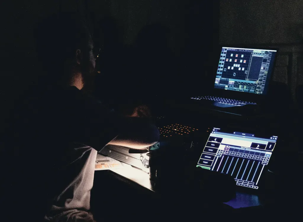 A bedroom desk at night
