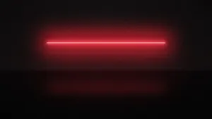 A single line of red light in a dark concrete room