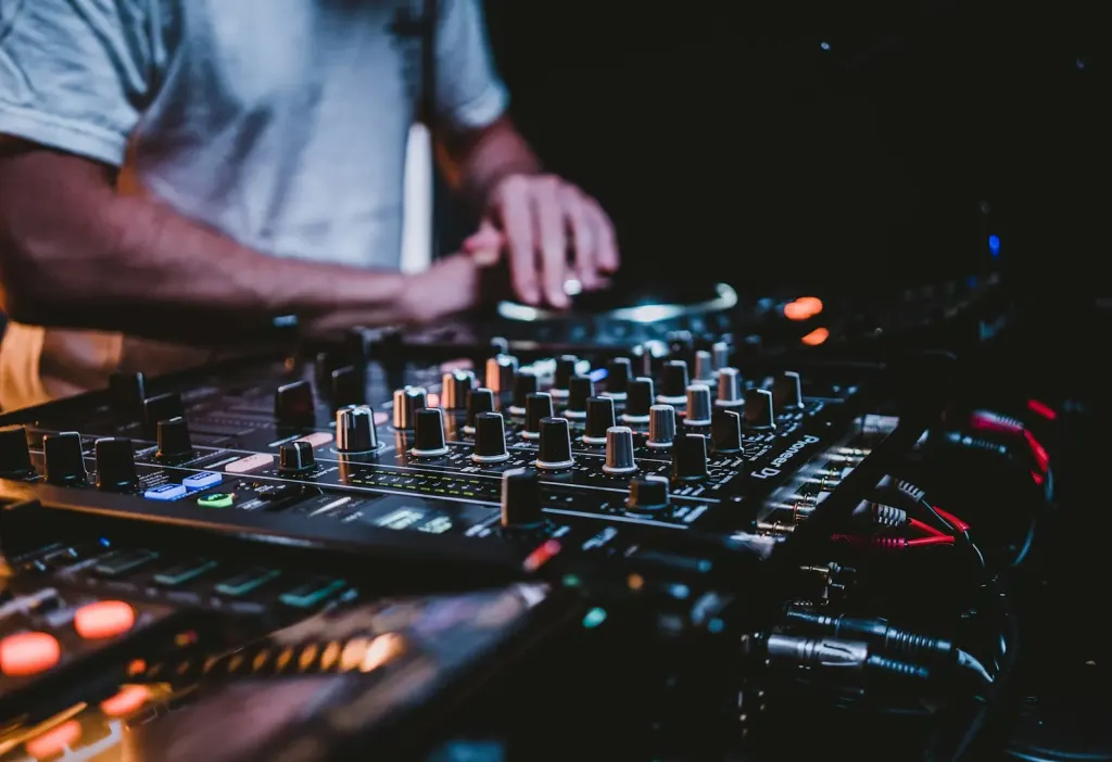 dj mixer faders closeup dark