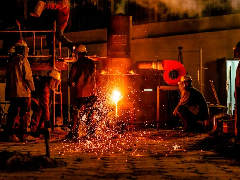 Workshop forge glowing at night, the factory belt after dark