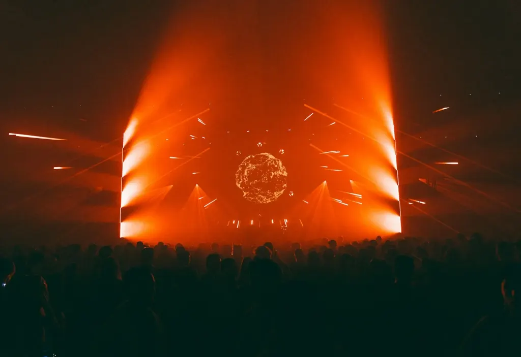 festival stage orange light rings