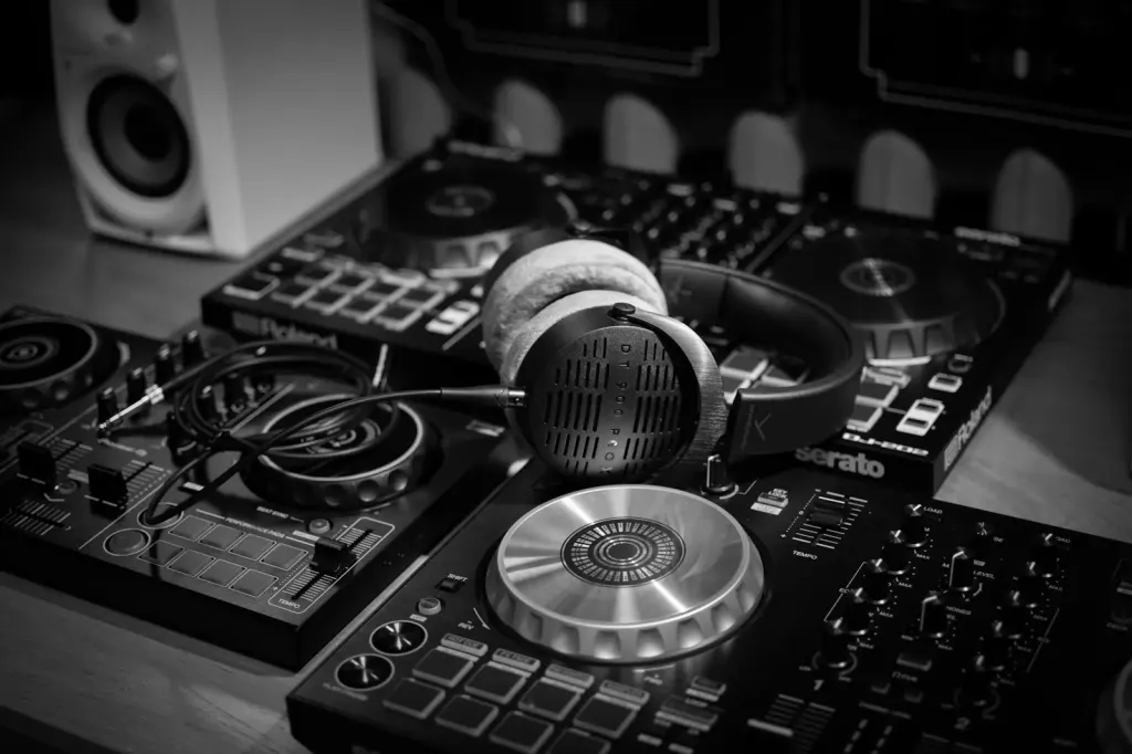 headphones resting on dj mixer