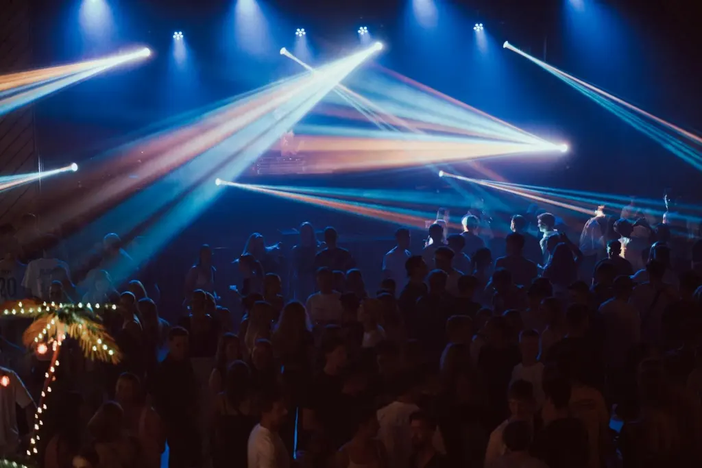 light beams over crowd