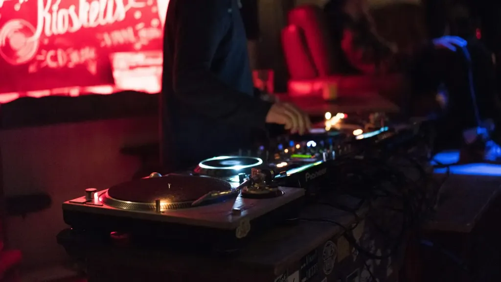 turntables in dark booth