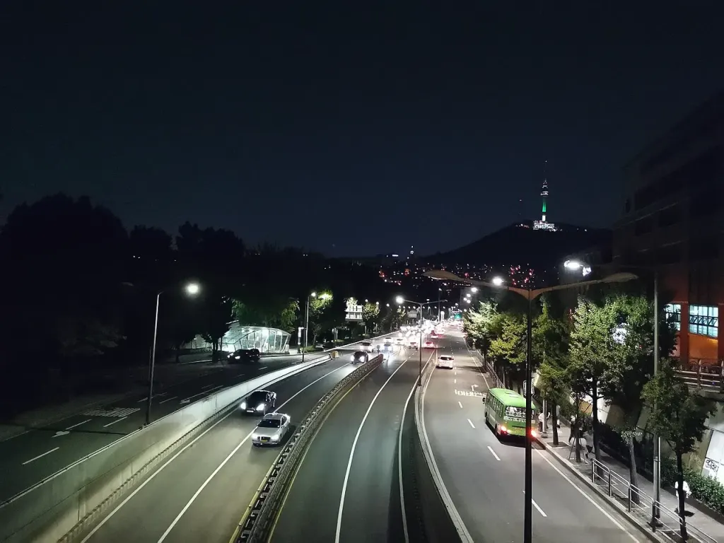 Itaewon road at night with N Seoul Tower
