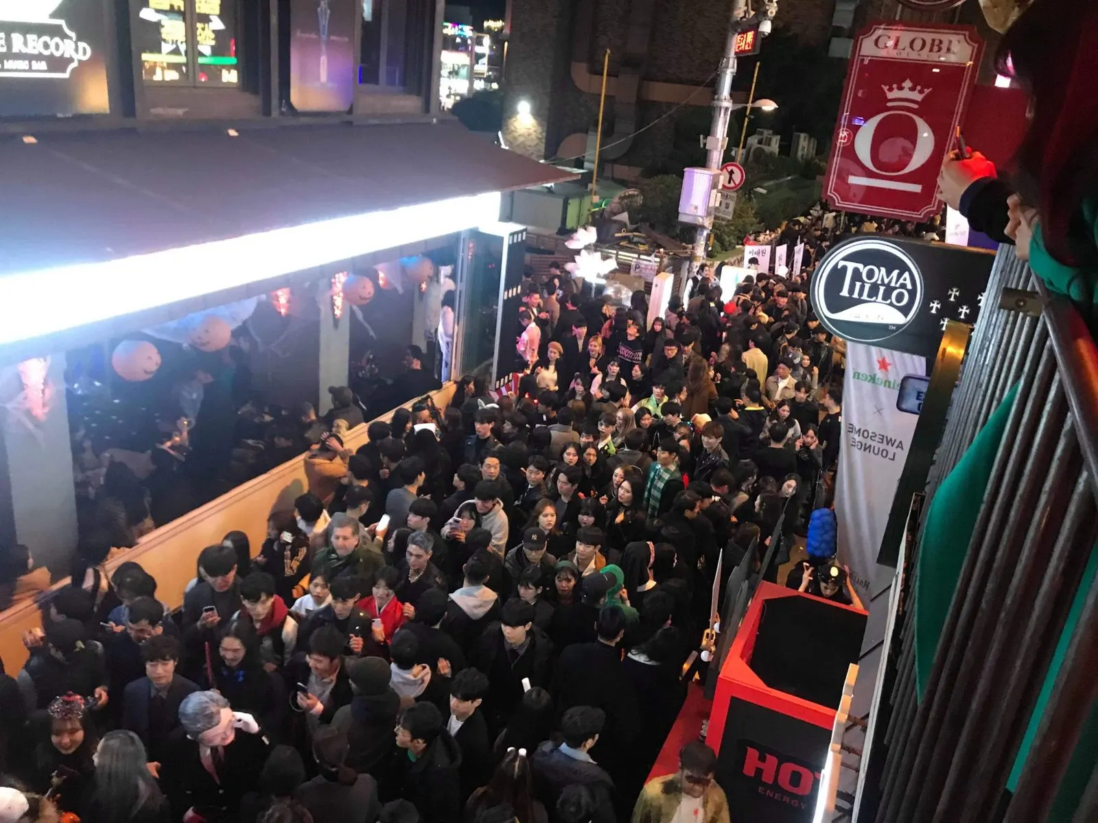 A Halloween crowd filling an Itaewon street, seen from above